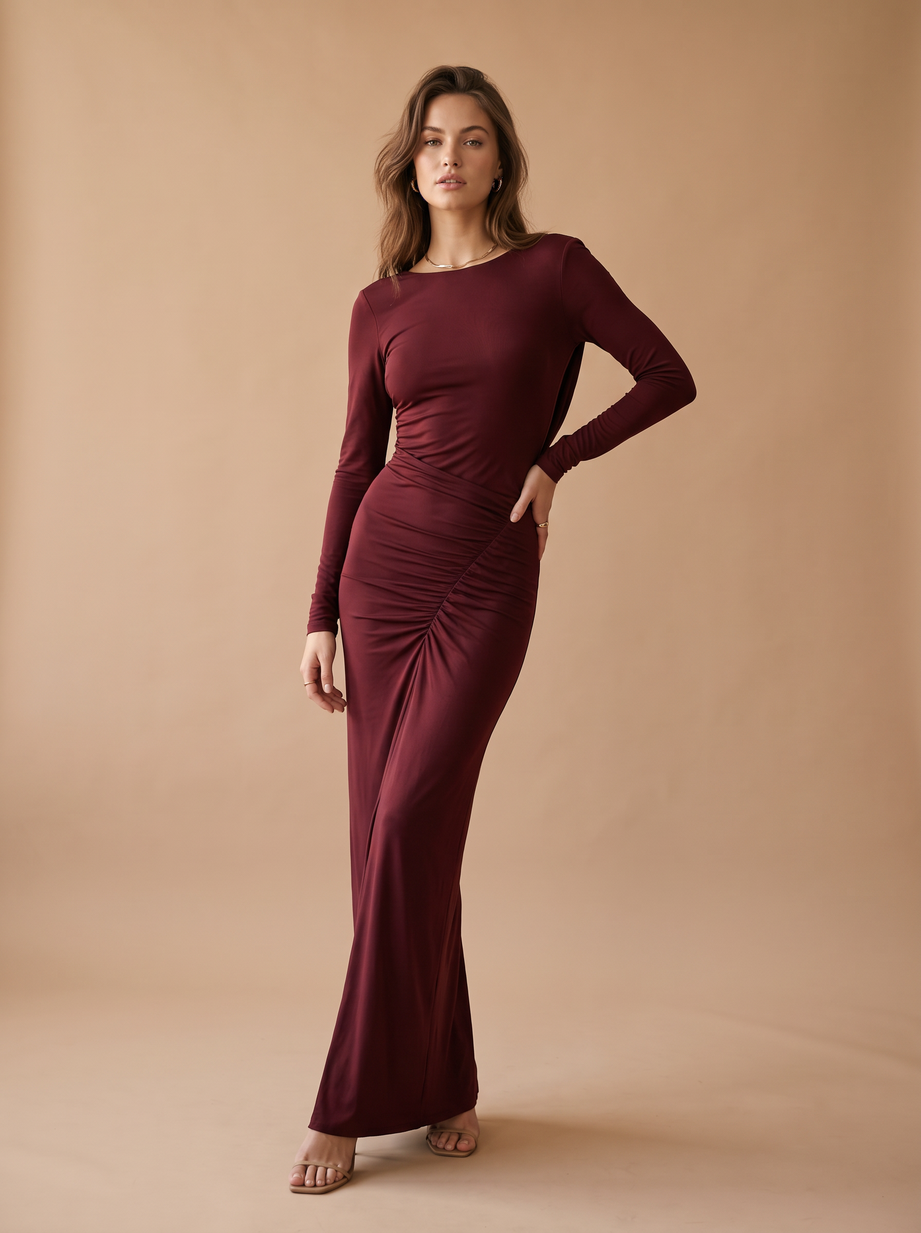 Figure‑hugging maxi dress with open back